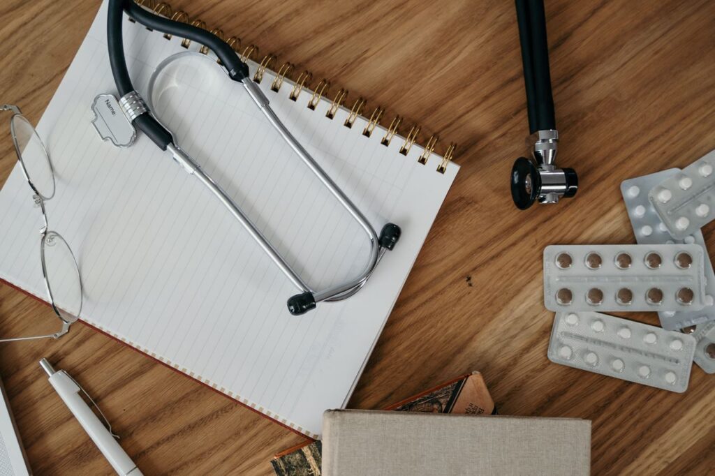 Mastering the First Impression: Your intriguing post title goes here Flat lay of medical tools and supplies on a wooden desk surface.